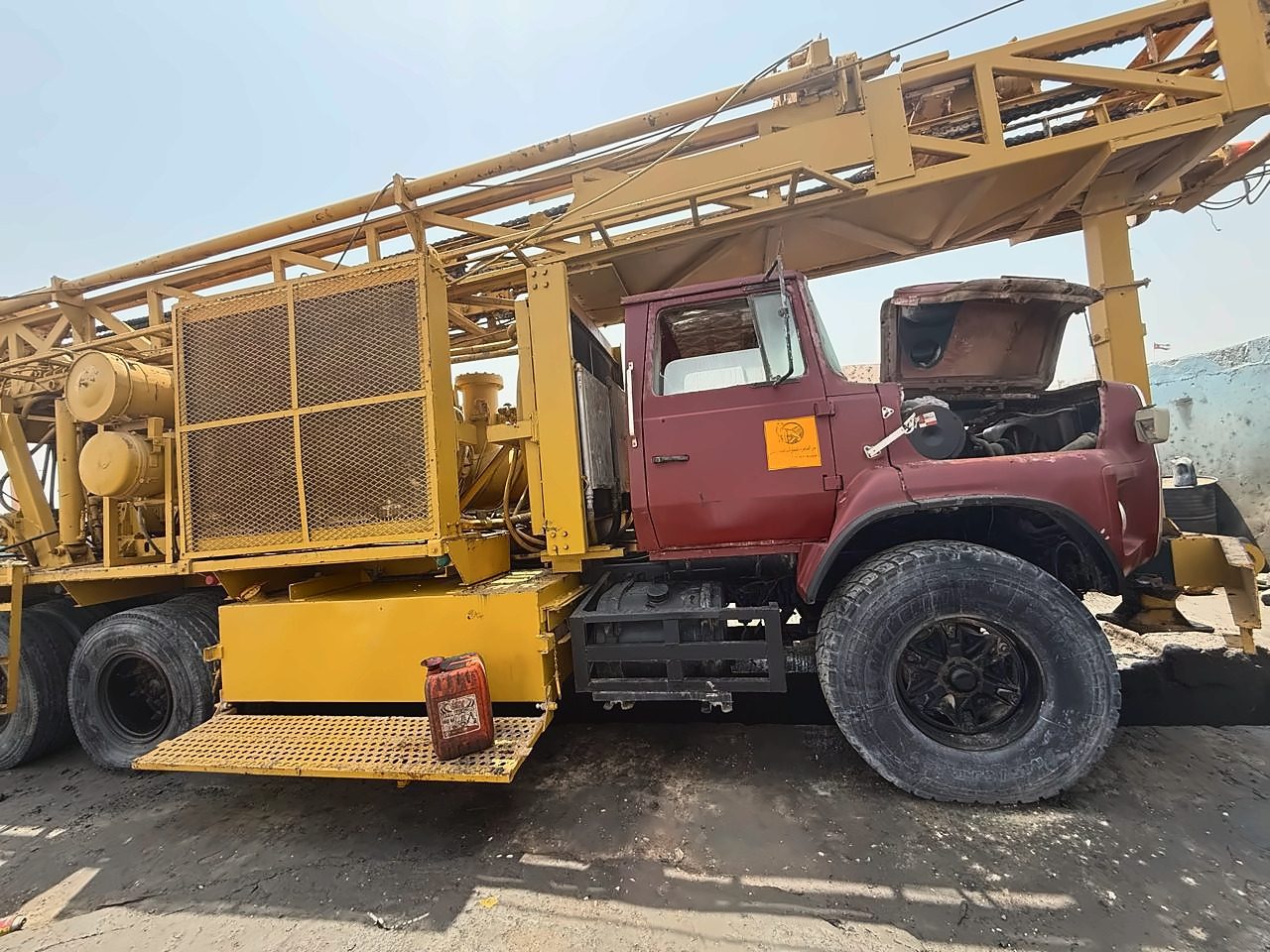 Truck-mounted drilling rig with a Ford cab